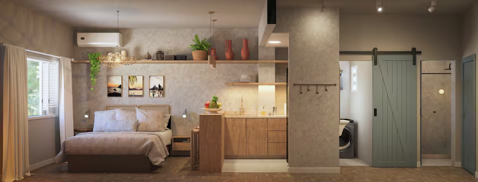 Ambiente integrado de sala de estar e dormitório em loft em Copacabana, com painel de TV, nichos e iluminação aconchegante.
